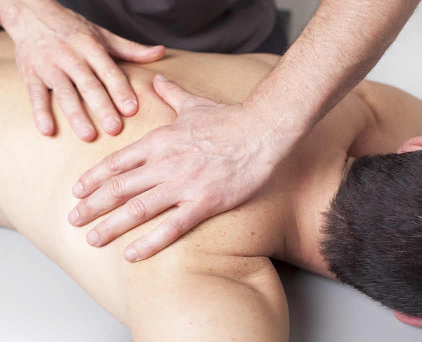 Back massage given to a young man